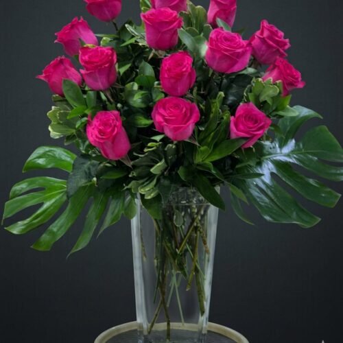 IMG-20260318-WA0012 14 roses in a vase